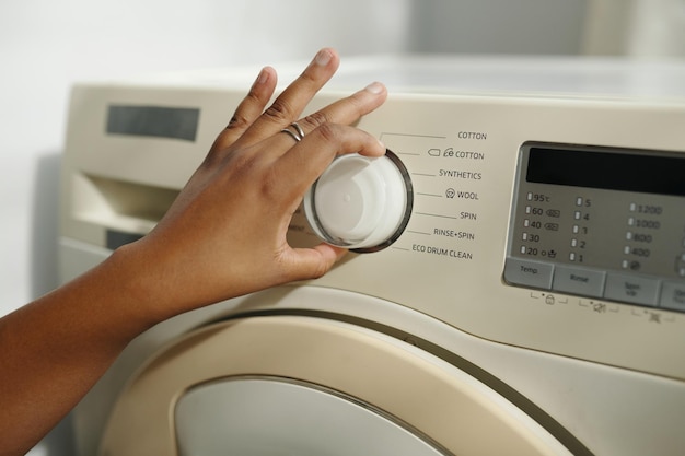 adjusting washing machine settings by hand