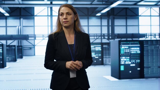 Admin walking in data center monitoring systems