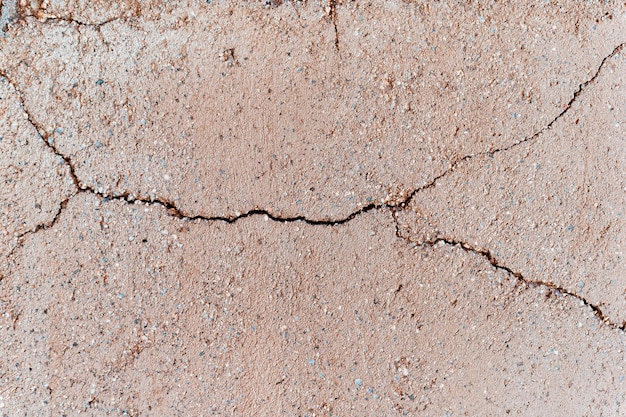 Adobe old cracked wall texture background