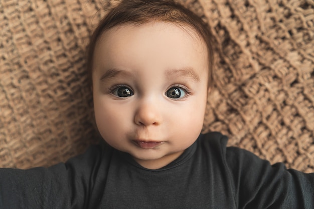 The adorable baby boy with beautiful eyes