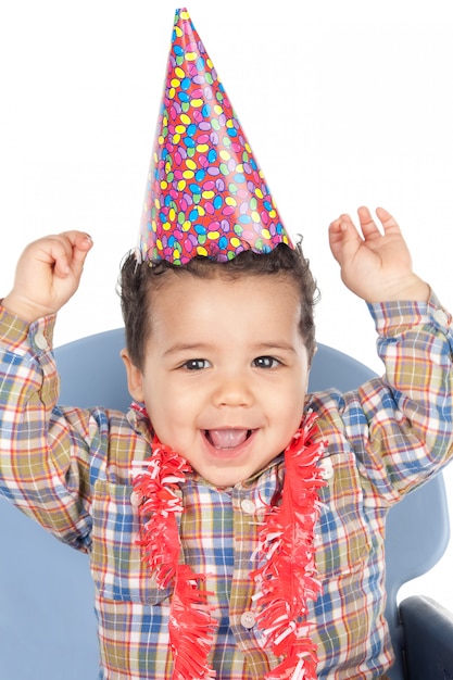 Adorable baby celebrating the birthday isolated on a over white background