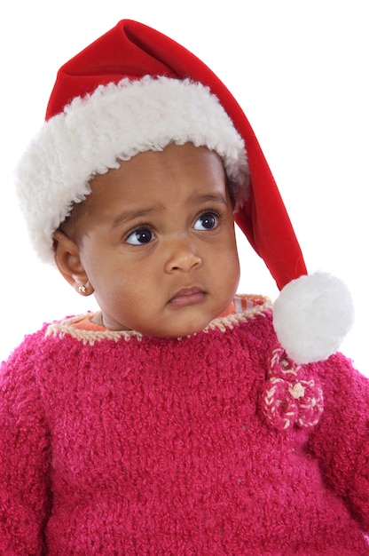 Adorable baby girl with santa claus hat 