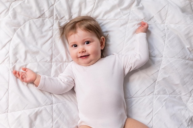 adorable baby in white shirt and diaper on blanket card banner space for text