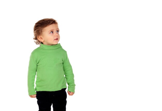 Adorable baby with green shirt  