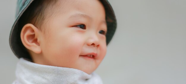 Adorable black haired asian kid