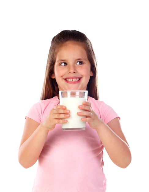 Photo adorable child drinking milk