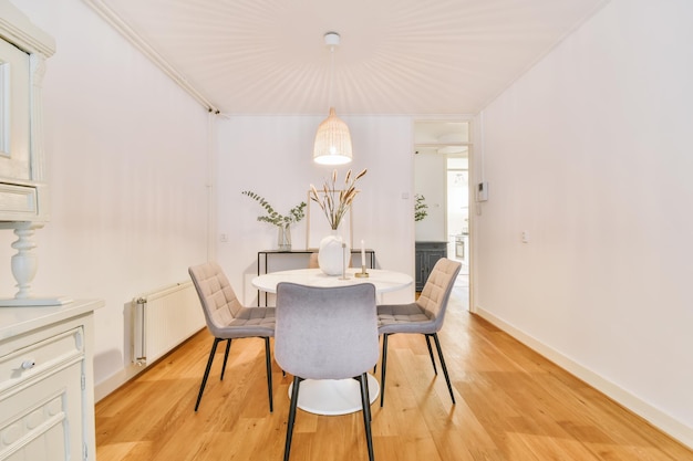 Adorable dining area with white round table