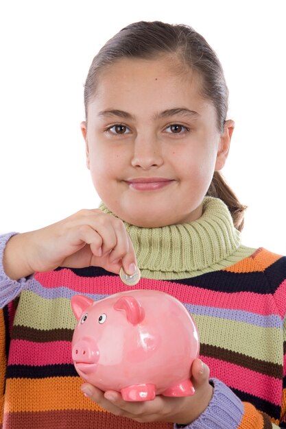 Adorable girl with moneybox isolated over white