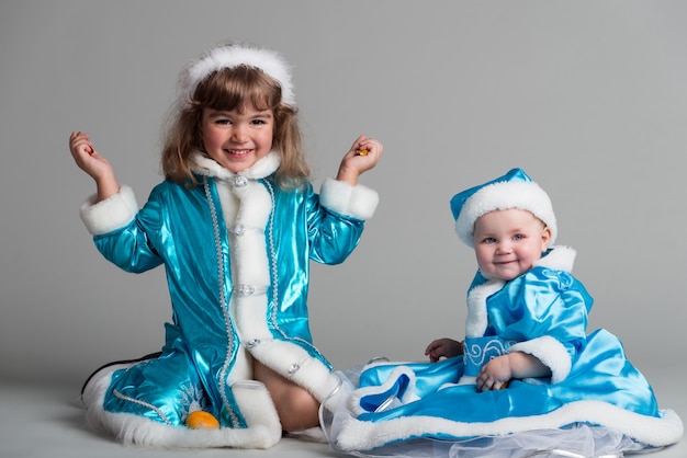 Adorable girls in Snow Maidens costumes