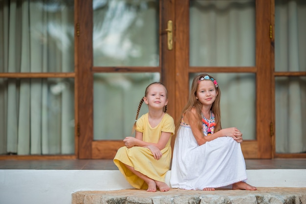 Adorable little girls on summer exotic vacation