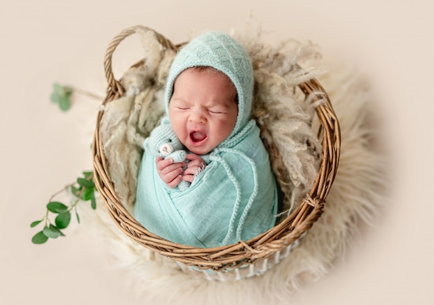 Adorable newborn yawning