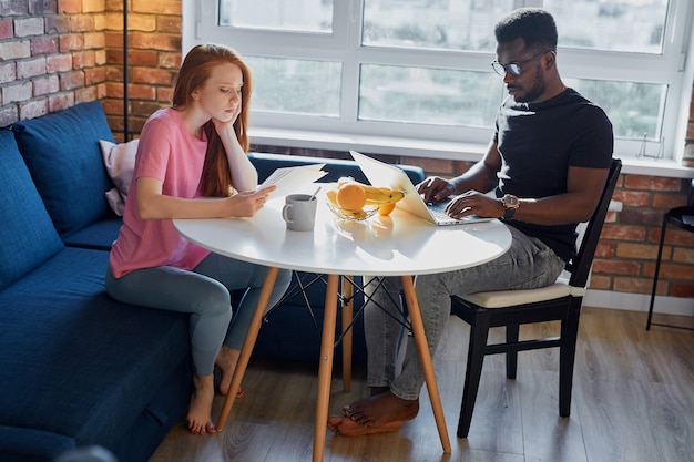 Adorable redhead woman support working husband