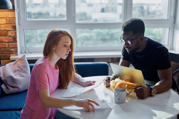 Adorable redhead woman support working husband