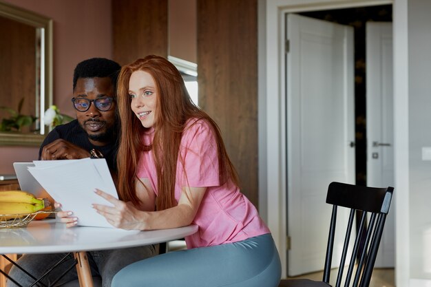 Adorable redhead woman support working husband