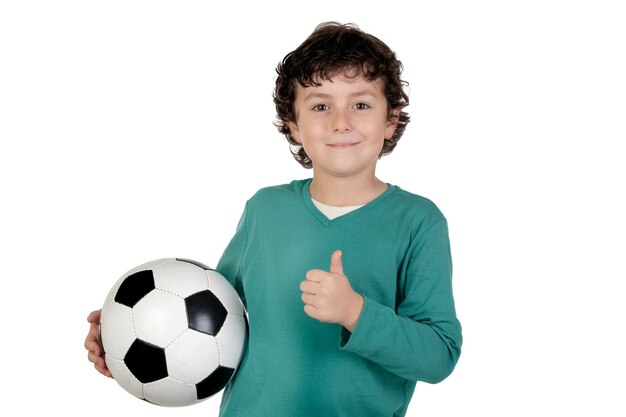 Adorable saying OK with a soccer ball isolated over white