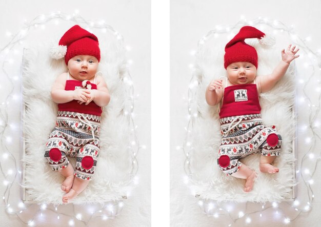 サンタ クロースの帽子をかぶって眠っている愛らしい新生児クリスマス新年