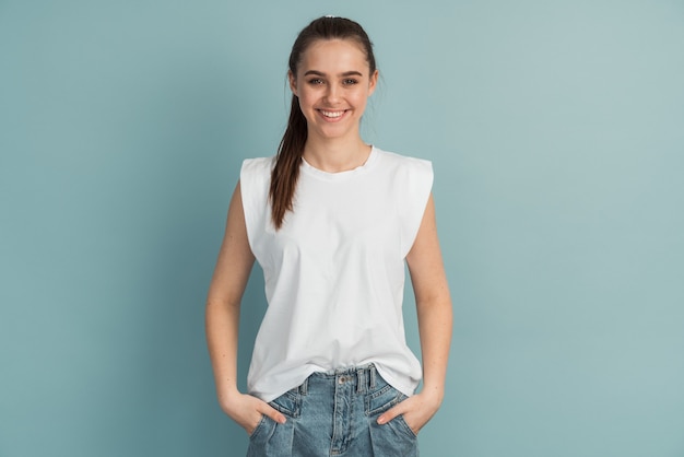 Adorable, smiling, young girl in a white Tshirt