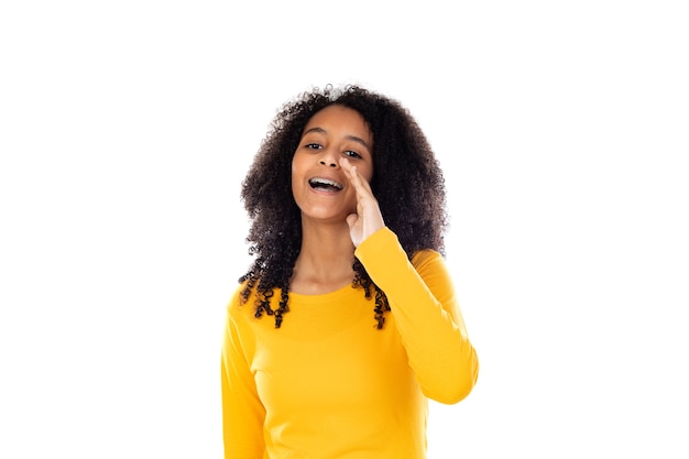 Adorable teenage doing gestures isolated on a white wall