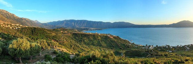 Adriatic sea evening coastline top view (Radhima, near Orikum, Albania). Three shots stitch high-resolution panorama.