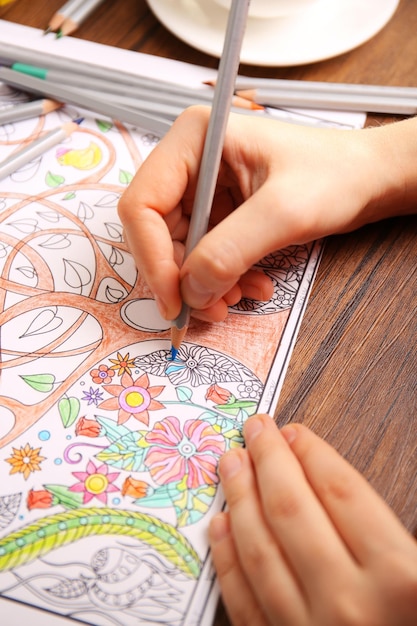 Photo adult antistress colouring book with pencils