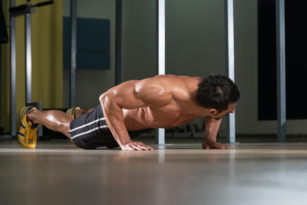 Adult Athlete Doing PushUps As Part Of Crossfit Training