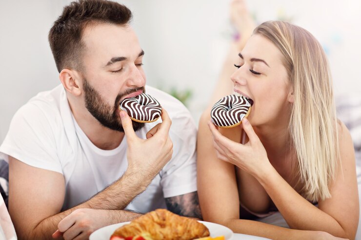 adult attractive couple in bed