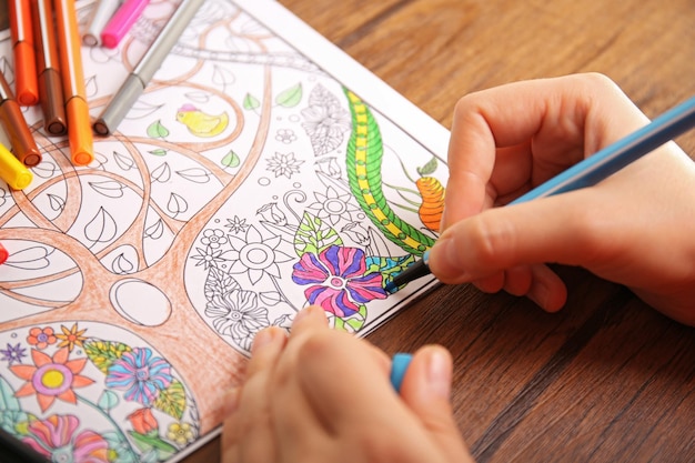 Photo adult colouring with soft tip pencils