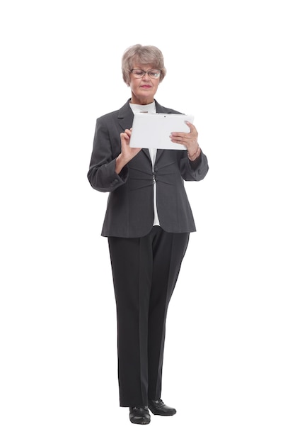 Adult female in black suit holding business papers in her hand