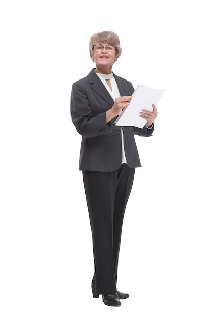 Adult female in black suit holding papers in her hand isolated on white