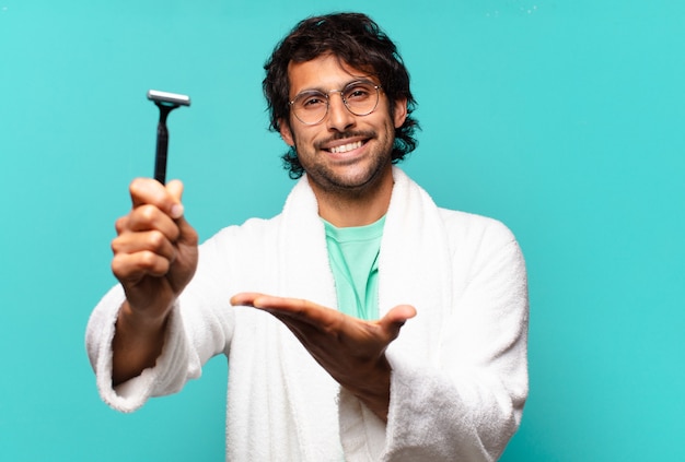 Adult handsome indian man shaving concept