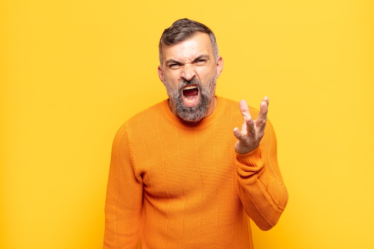 Photo adult handsome man looking angry, annoyed and frustrated screaming