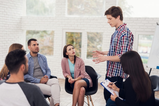 Adult handsome man stands in circle.