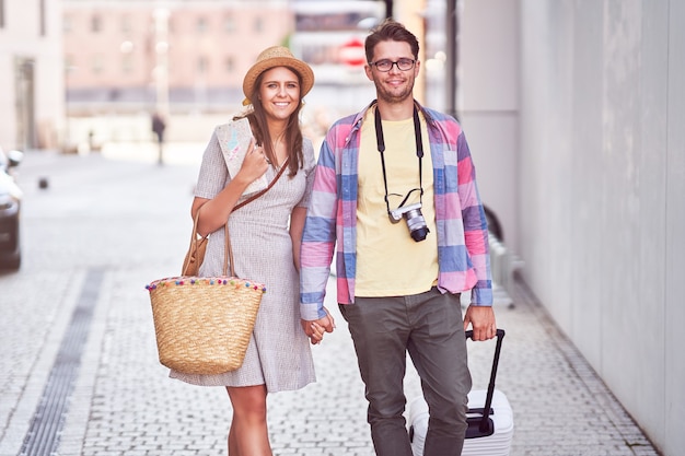 adult happy tourists sightseeing Gdansk Poland in summer