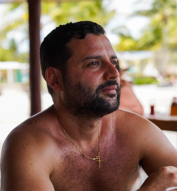 Adult man on a beach terrace