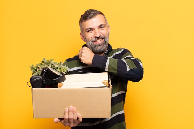 Adult man feeling happy, positive and successful, motivated when facing a challenge or celebrating good results