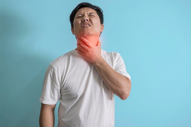 Adult man feeling hard throat neck lymph nodes pain health problems and issues concept