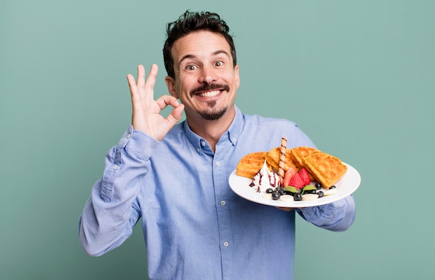 Photo adult man having waffles for breakfast