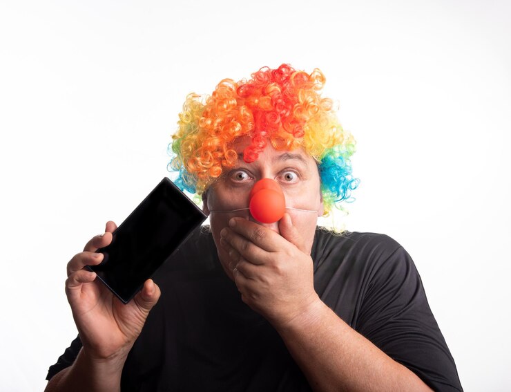 Photo adult man with wig and clown nose posing selective focus white background