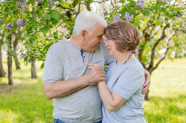 adult man and woman hugging outdoors portrait of a happy loving family romantic date