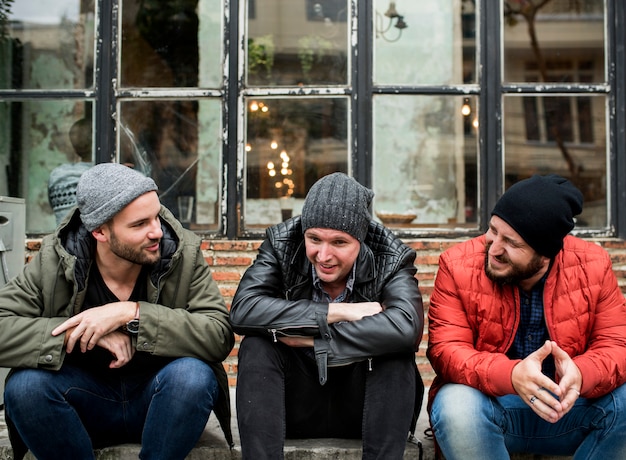 adult men talk sit together friends