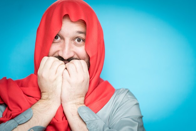 Adult Muslim man with scarf on head