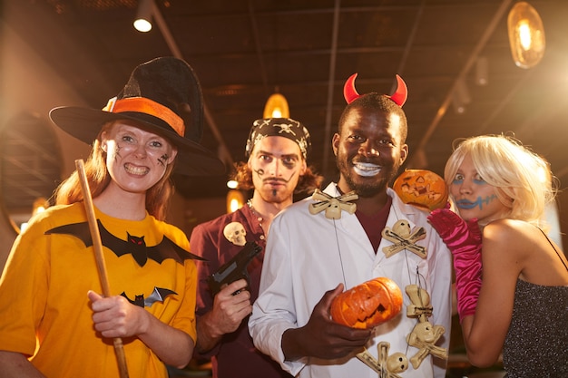 Photo adult people wearing halloween costumes