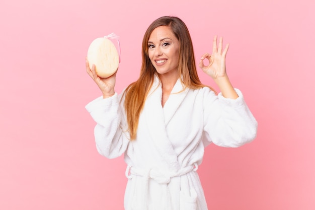 Adult pretty woman wearing bathrobe