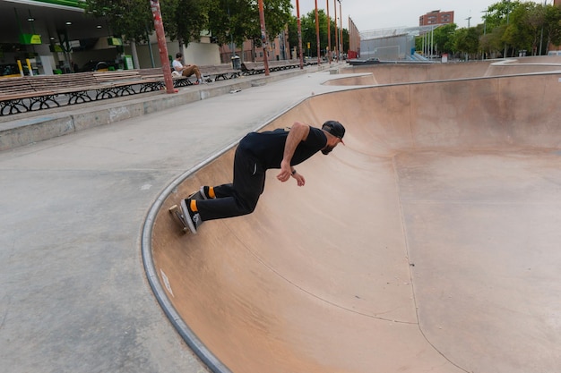 Adult skateboarder skating