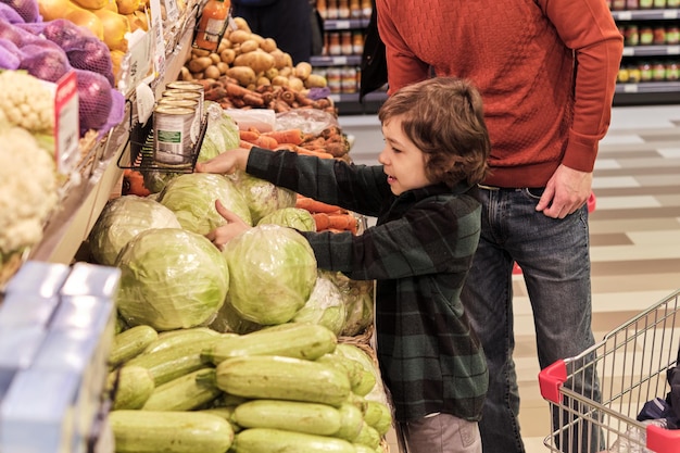 an adult stands by ensuring safety and offering subtle guidance emphasizing the role of family in