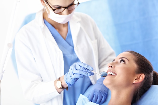 adult woman having a visit at the dentist's