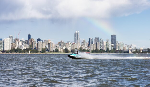 Adventurous caucasian woman on seadoo riding in the ocean