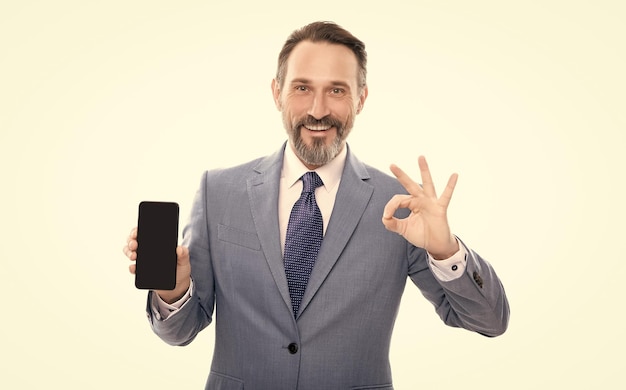 Advertisement presentation copy space grizzled man presenting phone screen