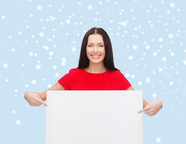 advertisement,sale and people concept - smiling young woman with blank white board