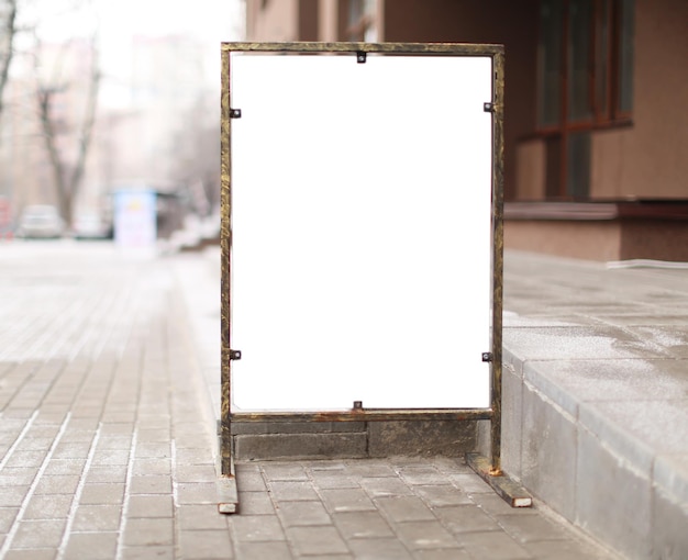 Advertising board on city street